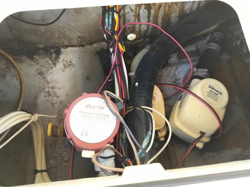 Slide: The Image of 1988 Mako 171 Center Console wiring and bilge pump system. - 22