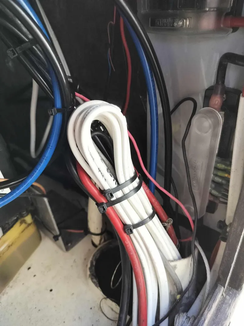 Slide: The Image of Wiring and cables inside a 1988 Mako 171 Center Console boat. - 27