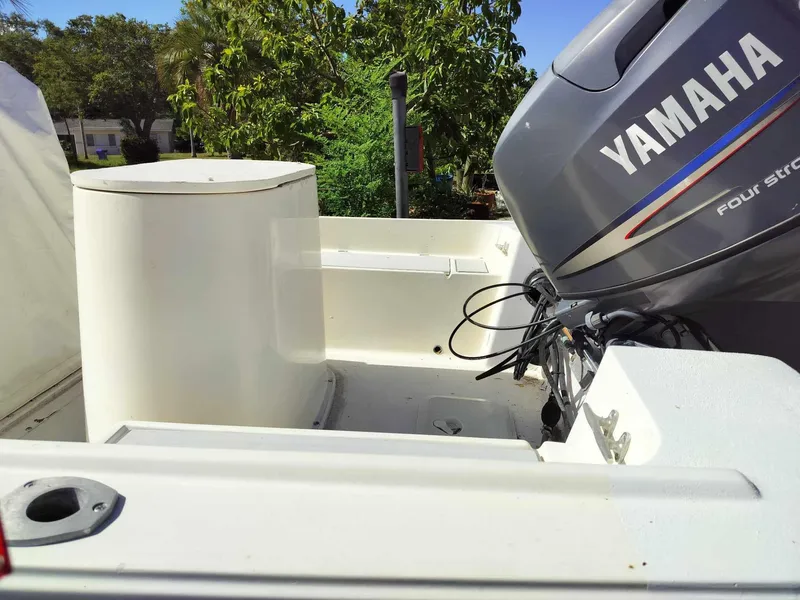 Slide: The Image of 1988 Mako 171 Center Console boat with Yamaha four-stroke outboard motor. - 35