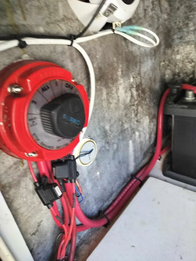 Slide: The Image of 1988 Mako 171 Center Console battery switch and wiring. - 44