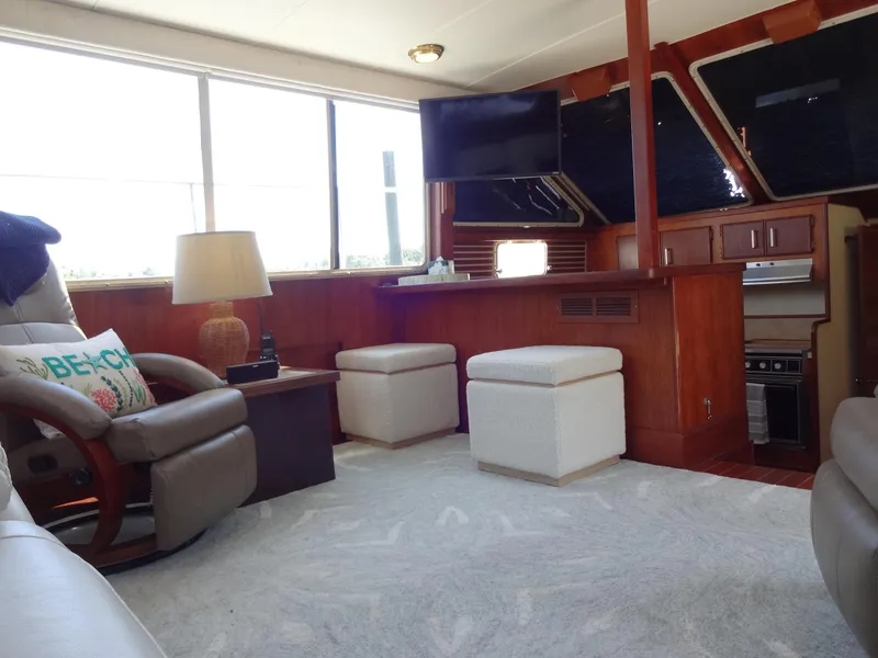 Slide: The Image of Interior of 1986 Tollycraft 44 CPMY yacht with cozy seating and modern amenities. - 45