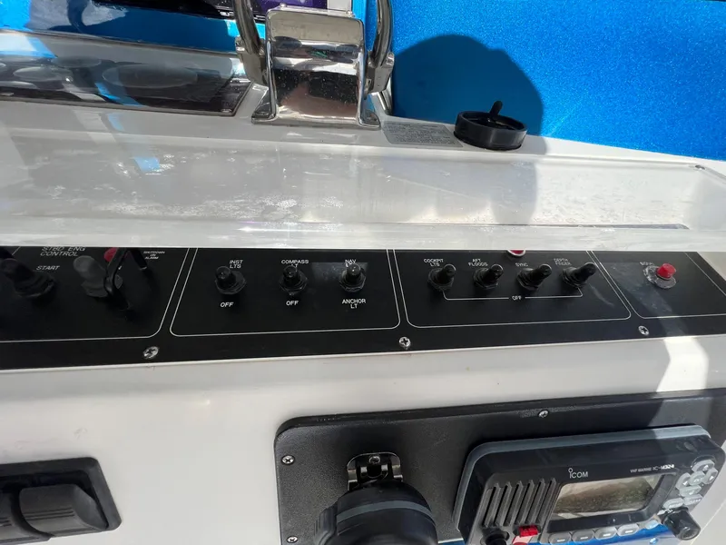 Slide: The Image of Control panel of a 2000 Cabo 35 Flybridge Sportfisher boat. - 29