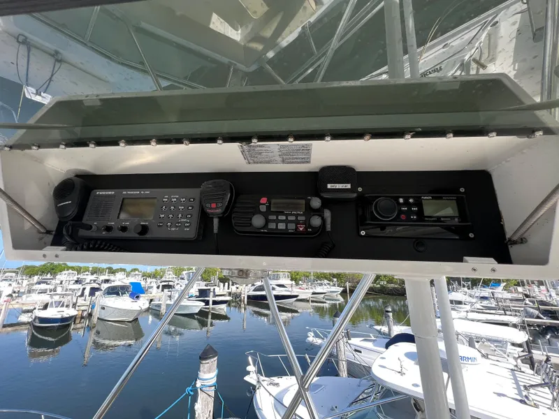 Slide: The Image of Control panel of a 2000 Cabo 35 Flybridge Sportfisher at a marina. - 32