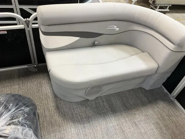 Slide: The Image of 2025 Bennington 20 SVL boat interior with plush seating and modern design. - 15