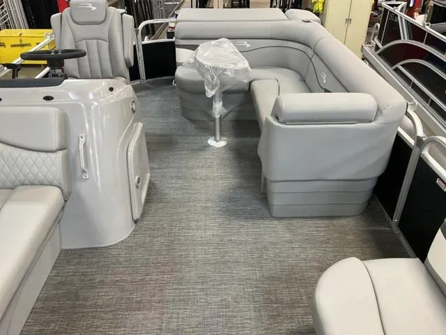 Slide: The Image of 2025 Bennington 20 SVL pontoon boat interior with gray seating and modern design. - 16