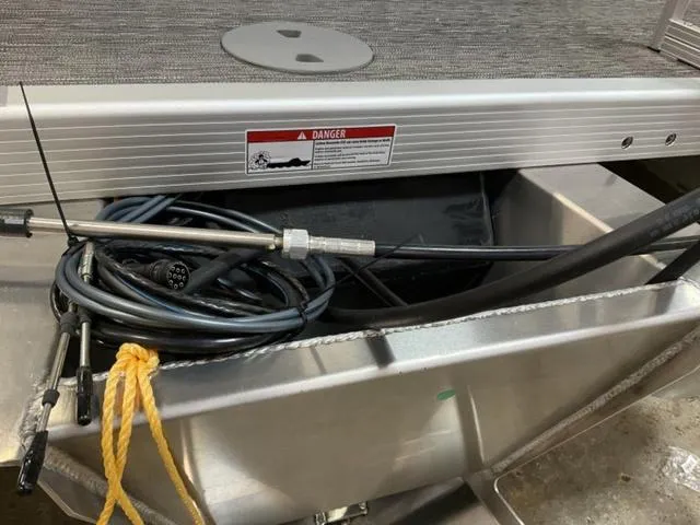 Slide: The Image of 2025 Bennington 20 SVL boat wiring and components with safety warning label. - 7