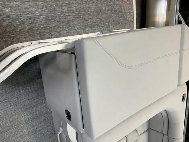 Slide: The Image of 2025 Bennington 20 SVL boat interior with sleek, modern upholstery design. - 9