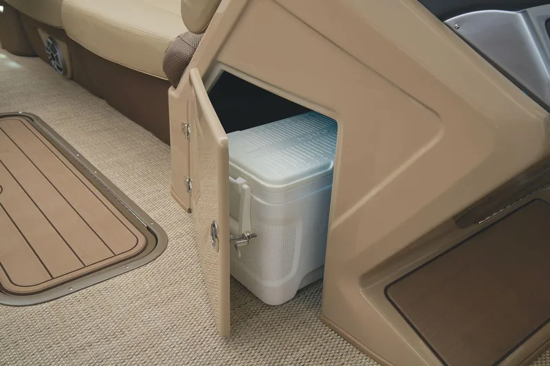 Slide: The Image of 2024 Regency 250 DL3 storage compartment with cooler. - 27
