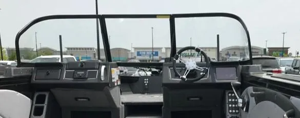 Slide: The Image of 2023 Ranger VX1888 WT boat interior with steering console and dashboard. - 4