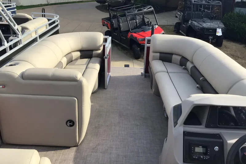 Slide: The Image of 2024 Sun Tracker Party Barge 20 DLX interior with spacious seating and modern design. - 3