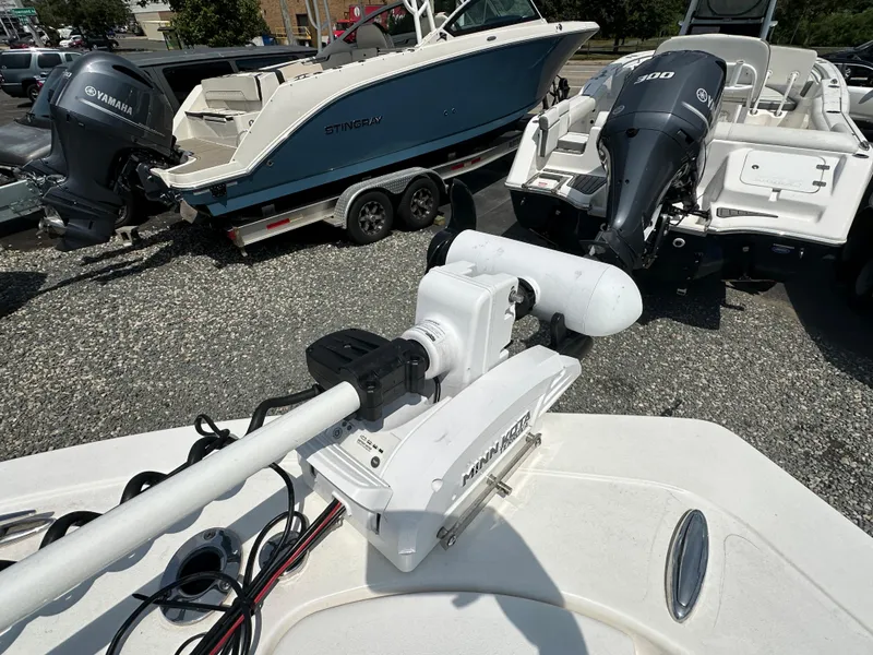Slide: The Image of 2022 Tidewater 198 CC boat with Minn Kota trolling motor and Yamaha outboard engines. - 13