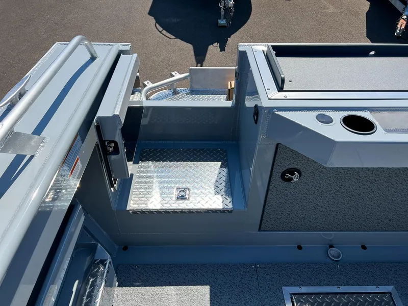 Slide: The Image of 2023 Hewescraft 240 Ocean Pro HT boat deck with diamond plate flooring. - 20