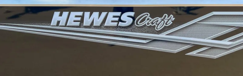 Slide: The Image of Hewescraft 240 Ocean Pro HT 2023 logo on boat exterior - 24