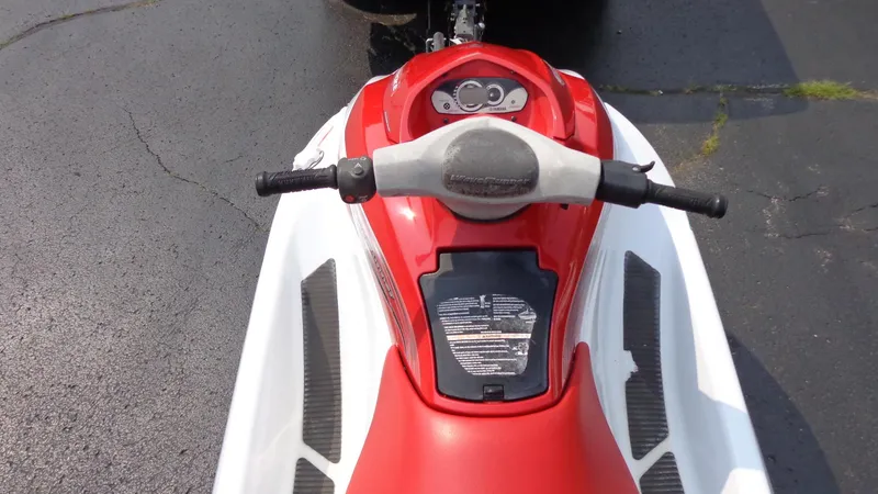 Slide: The Image of 2005 Yamaha WaveRunner VX 110 Sport, red and white, top view of handlebars and dashboard. - 4