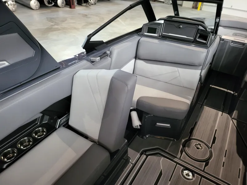 Slide: The Image of 2024 Supra SL interior with sleek gray seating and modern design. - 16