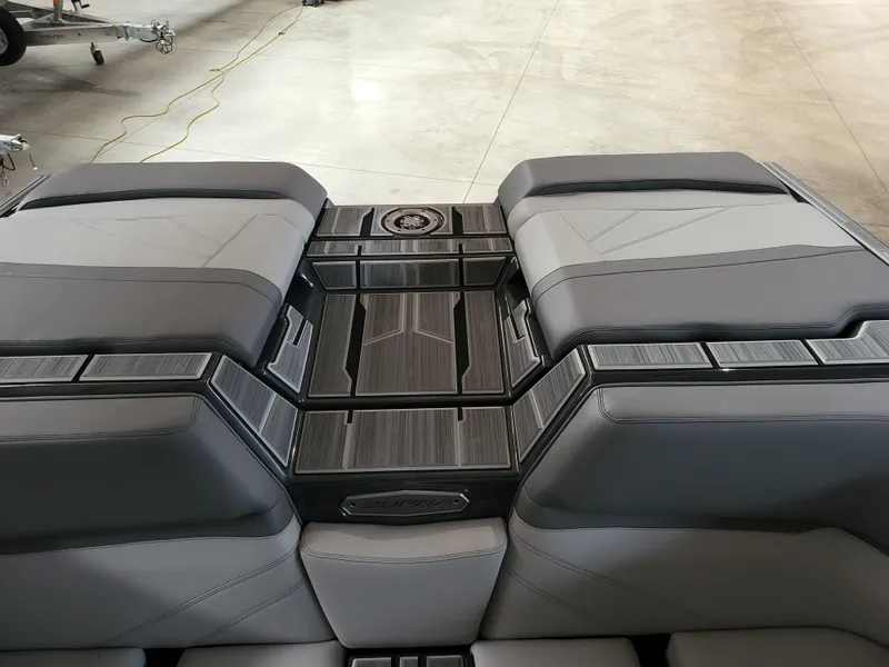 Slide: The Image of 2024 Supra SL boat interior with sleek gray seating and modern design. - 4