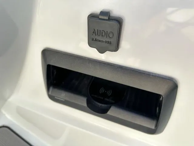 Slide: The Image of Audio input and USB port on 2023 JC SportToon 24 TT boat. - 13