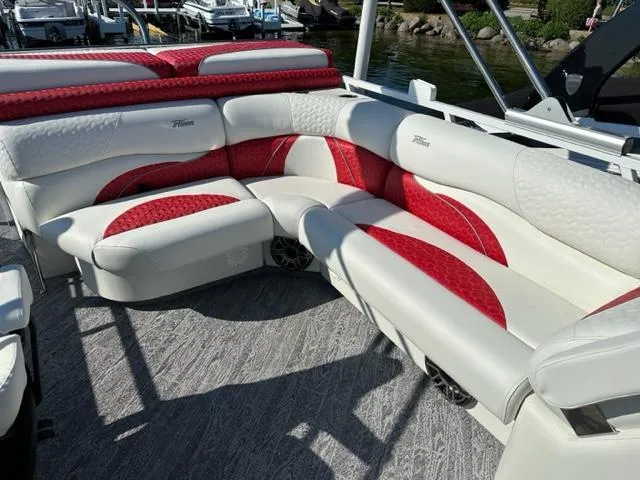 Slide: The Image of 2023 JC SportToon 24 TT pontoon boat with white and red seating. - 25