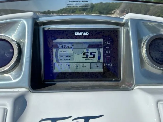 Slide: The Image of Dashboard of 2023 JC SportToon 24 TT boat with Simrad display. - 10