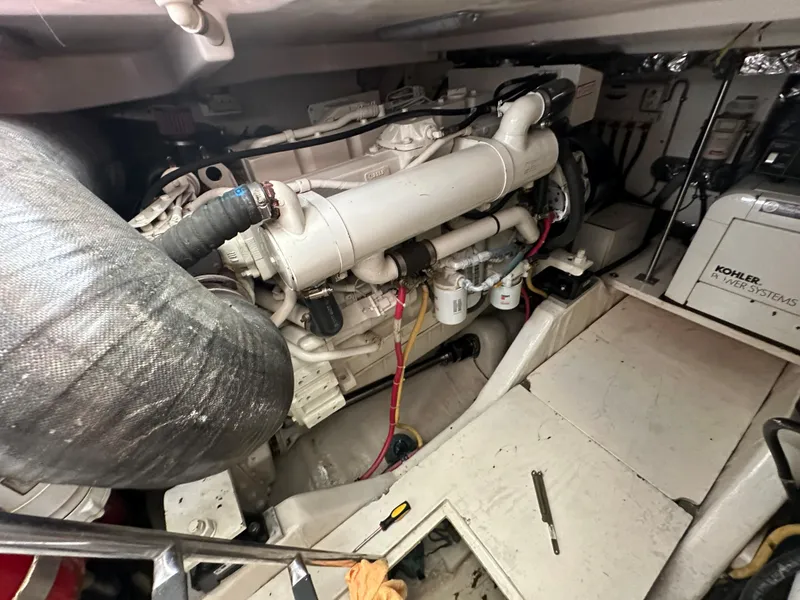 Slide: The Image of Engine room of a 2004 Tiara Yachts 3600 Sovran with visible Kohler generator. - 15