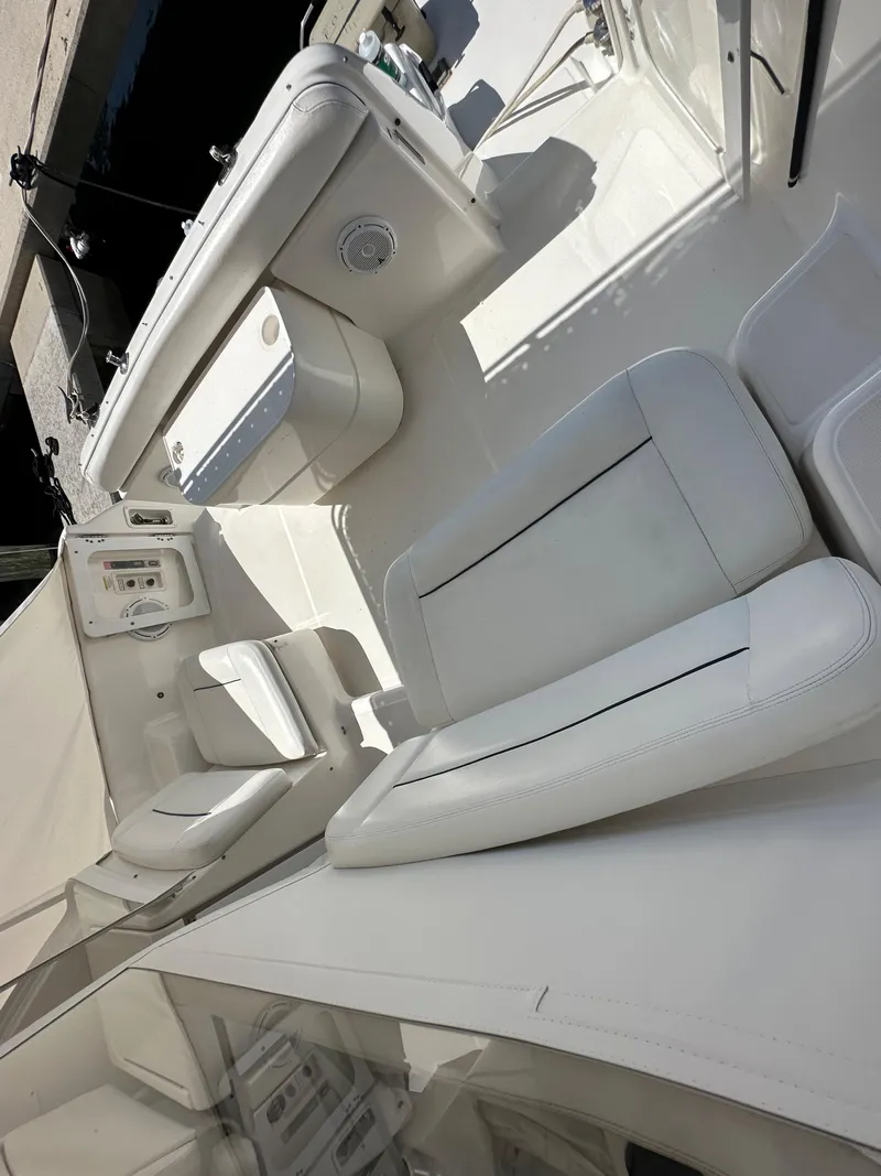 Slide: The Image of 2004 Tiara Yachts 3600 Sovran interior with white leather seating. - 21