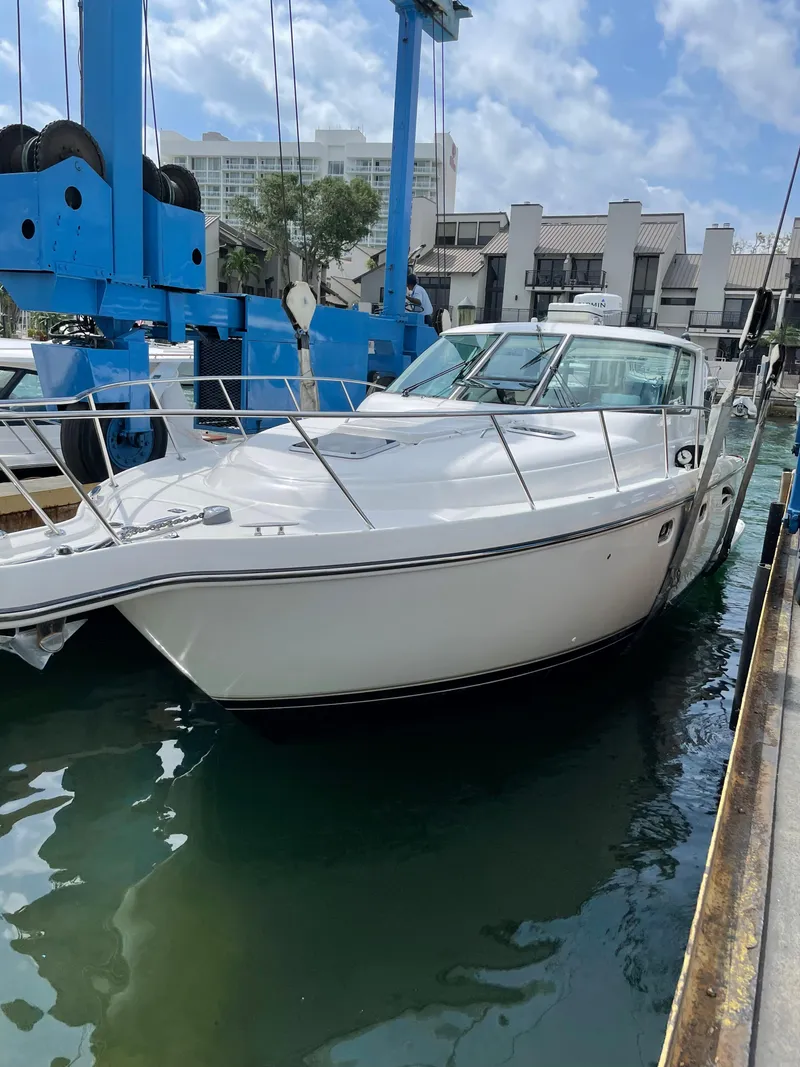 Slide: The Image of 2004 Tiara Yachts 3600 Sovran docked at marina. - 27