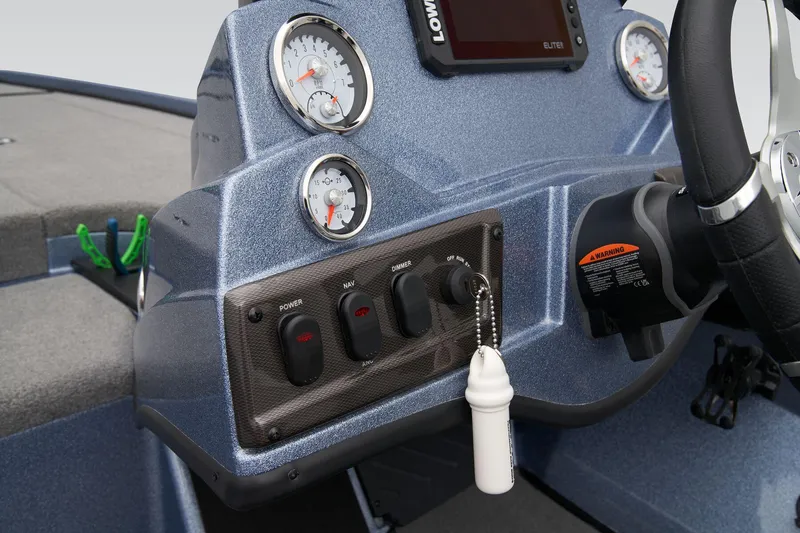 Slide: The Image of 2024 Nitro Z18 Pro boat dashboard with gauges and controls. - 30