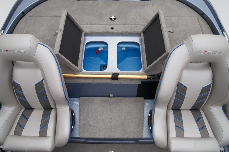 Slide: The Image of 2024 Nitro Z18 Pro boat interior with storage compartments and seating. - 40