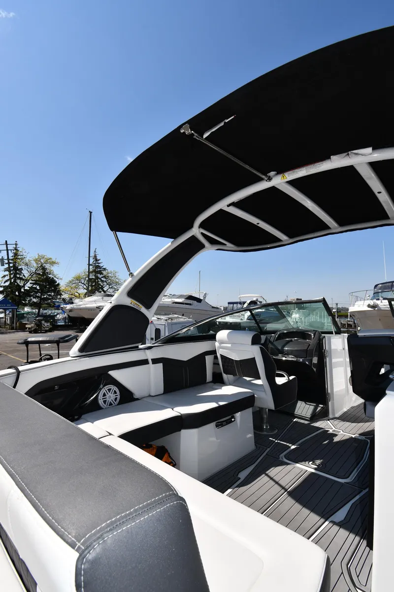 Slide: The Image of 2021 Monterey 278 Super Sport boat with spacious seating and sleek design. - 27