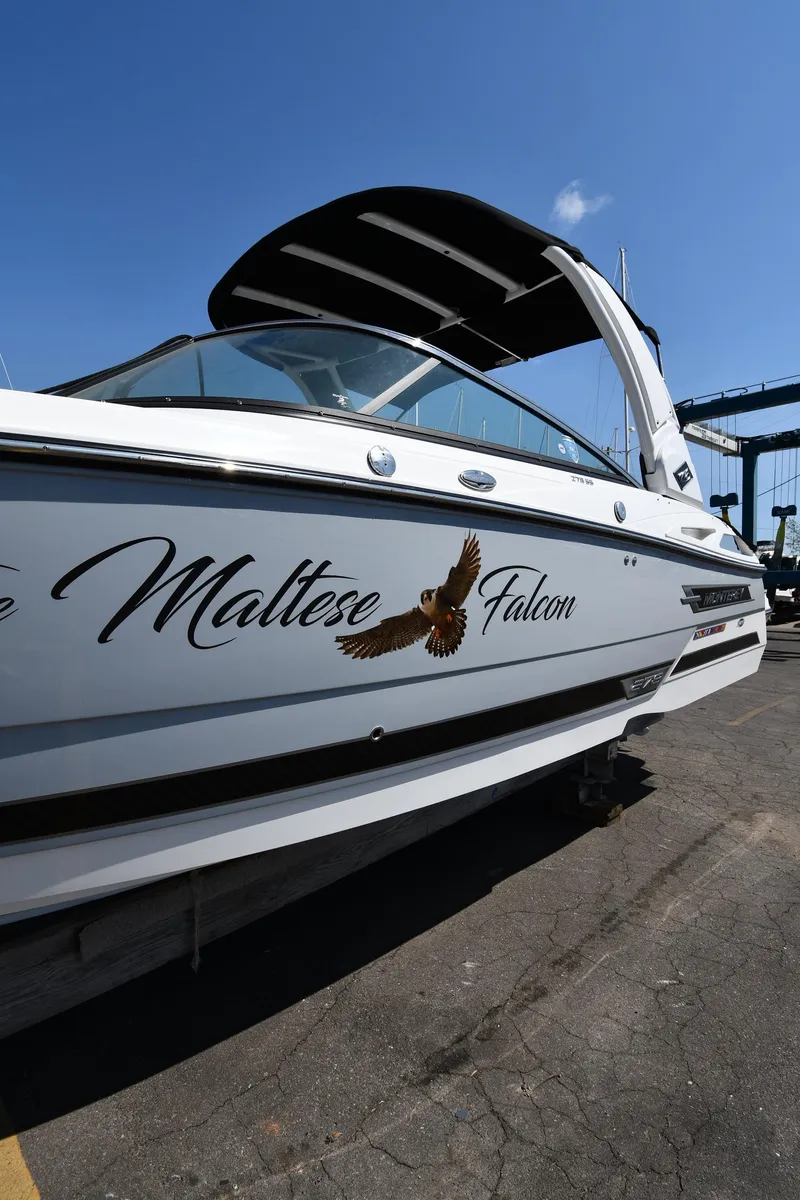 Slide: The Image of 2021 Monterey 278 Super Sport boat named Maltese Falcon docked at a marina. - 1