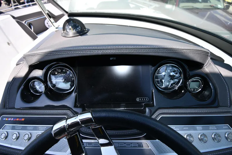 Slide: The Image of 2021 Monterey 278 Super Sport dashboard with steering wheel and instrument panel. - 16
