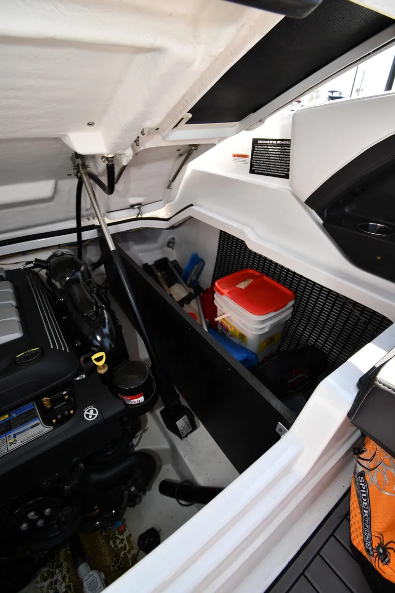 Slide: The Image of 2021 Monterey 278 Super Sport engine compartment with storage area. - 47