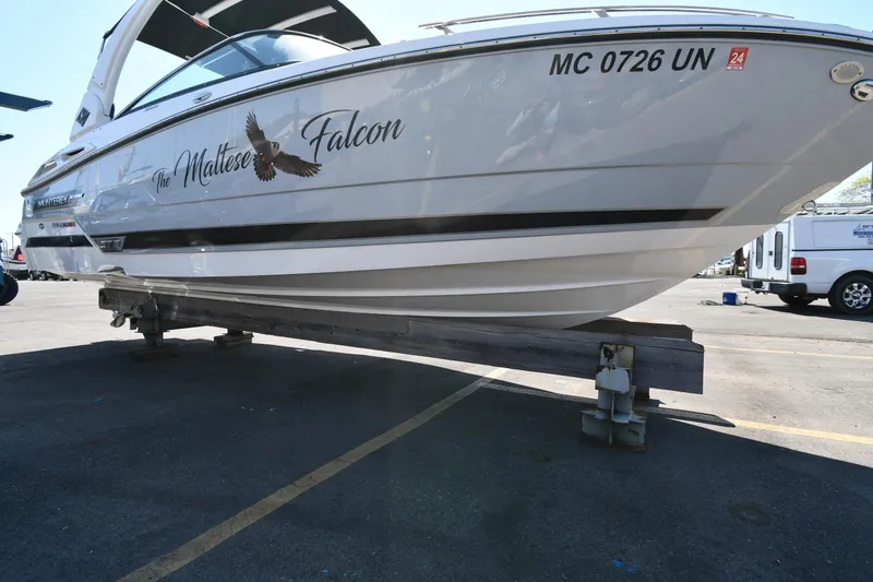 Slide: The Image of 2021 Monterey 278 Super Sport boat named The Maltese Falcon on a trailer. - 2
