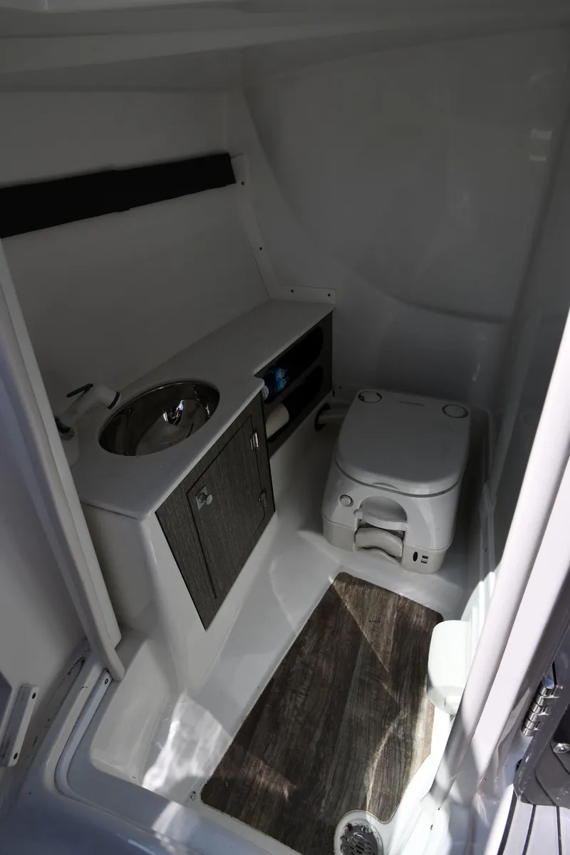 Slide: The Image of 2021 Monterey 278 Super Sport boat interior bathroom with sink and toilet. - 42