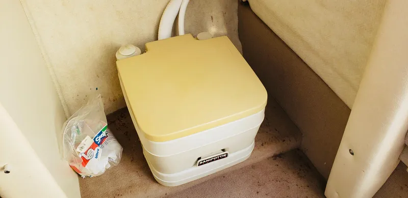 Slide: The Image of Portable toilet inside 2001 Sea Ray 225 Weekender boat cabin. - 9