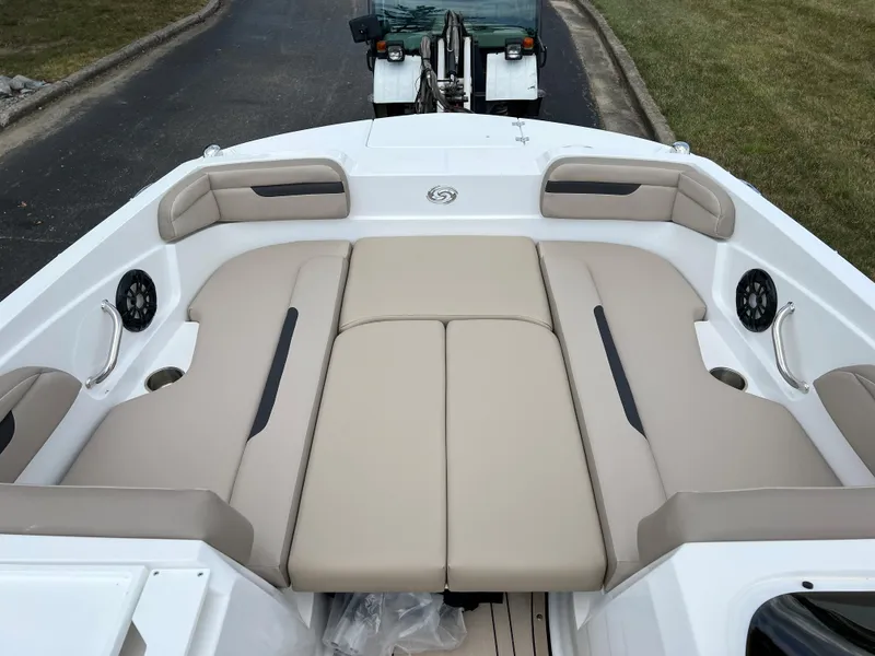 Slide: The Image of 2024 Hurricane SunDeck Sport 205 IO boat with spacious seating and modern design. - 10