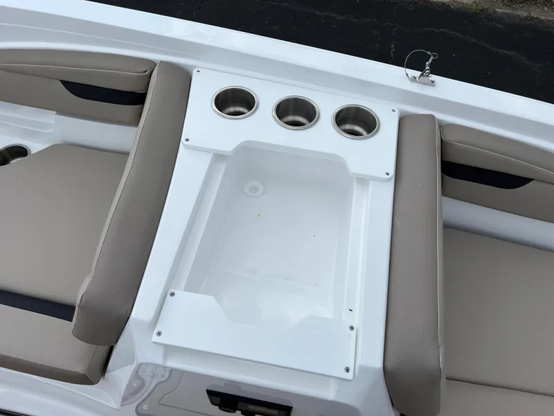 Slide: The Image of 2024 Hurricane SunDeck Sport 205 IO boat seating area with cup holders. - 15