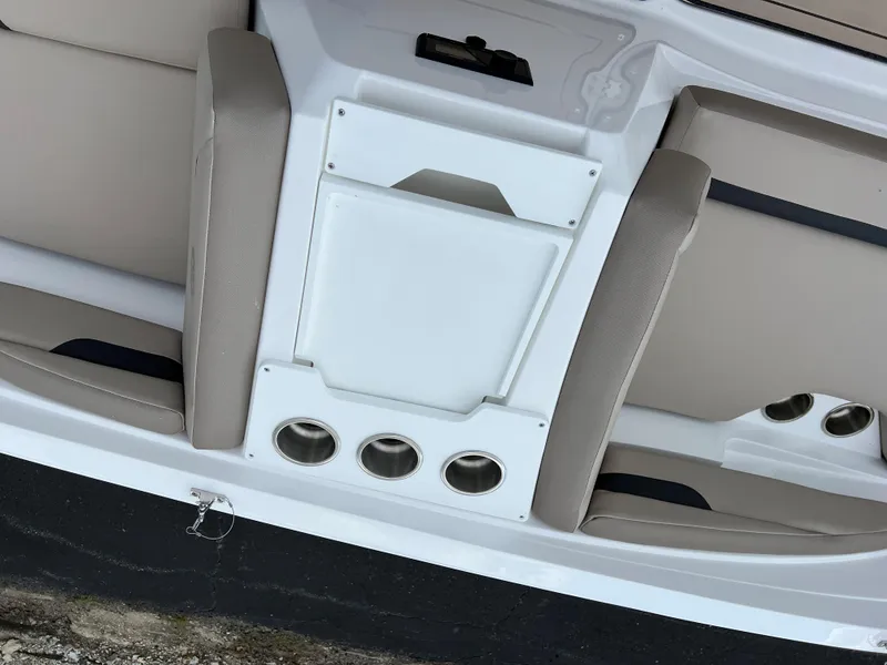 Slide: The Image of 2024 Hurricane SunDeck Sport 205 IO interior seating and cup holders. - 16