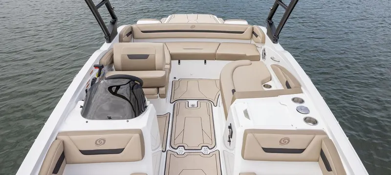Slide: The Image of 2024 Hurricane SunDeck Sport 205 IO boat interior with beige seating and spacious layout. - 30