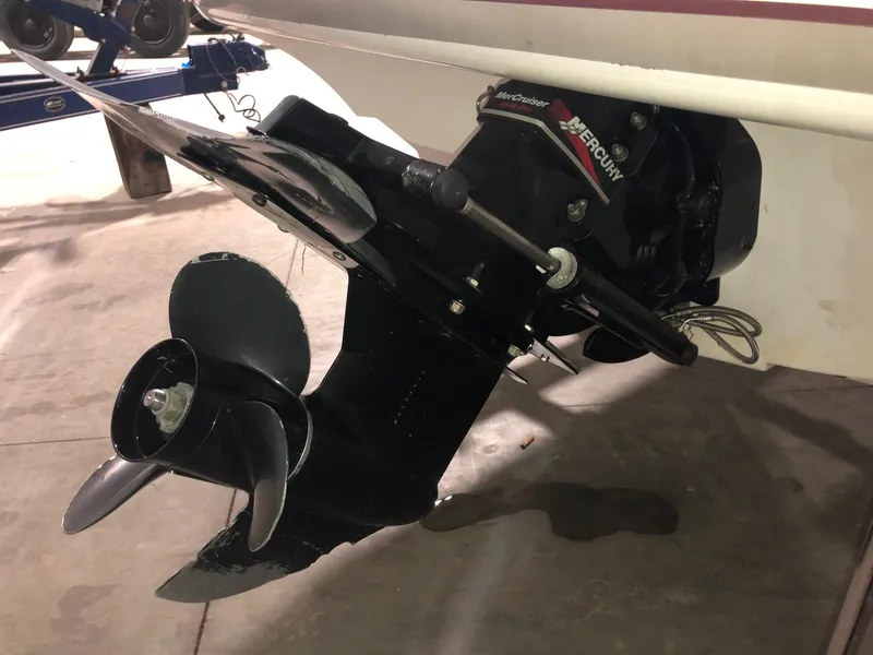 Slide: The Image of 2002 Maxum 1900 SR boat with MerCruiser outdrive and propeller. - 4