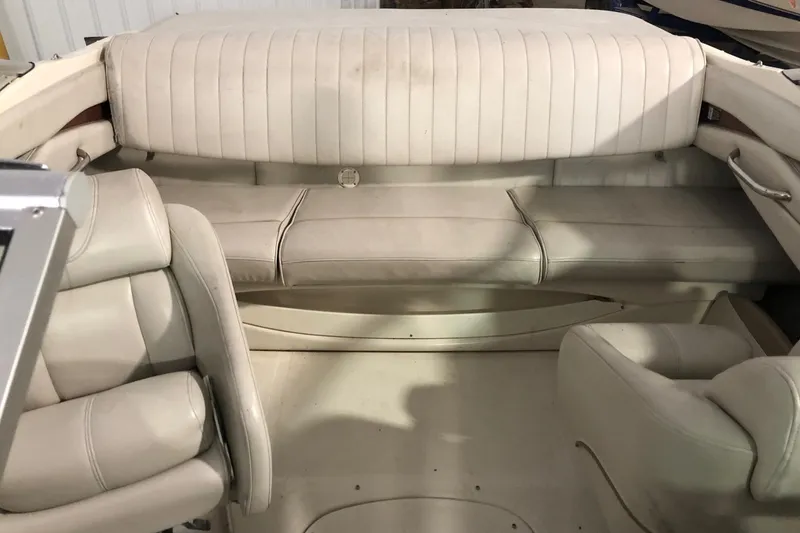 Slide: The Image of 2002 Maxum 1900 SR boat interior with white leather seats. - 6