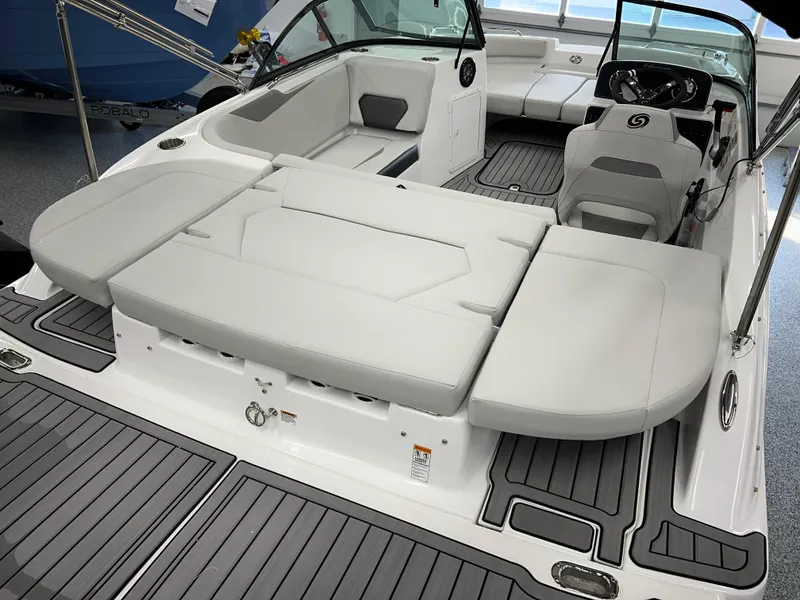 Slide: The Image of 2024 Hurricane SunDeck 187 IO boat interior with spacious seating and modern design. - 4