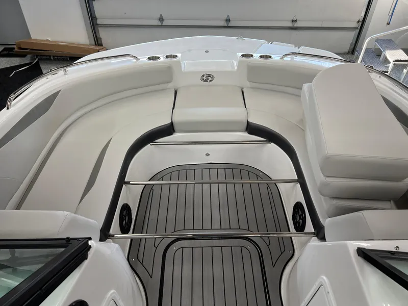 Slide: The Image of 2024 Hurricane SunDeck 187 IO boat interior with sleek seating and modern design. - 9