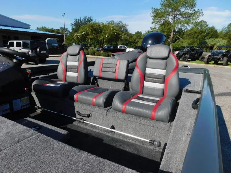 Slide: The Image of 2024 Ranger RT198P boat interior with gray and red seats. - 10