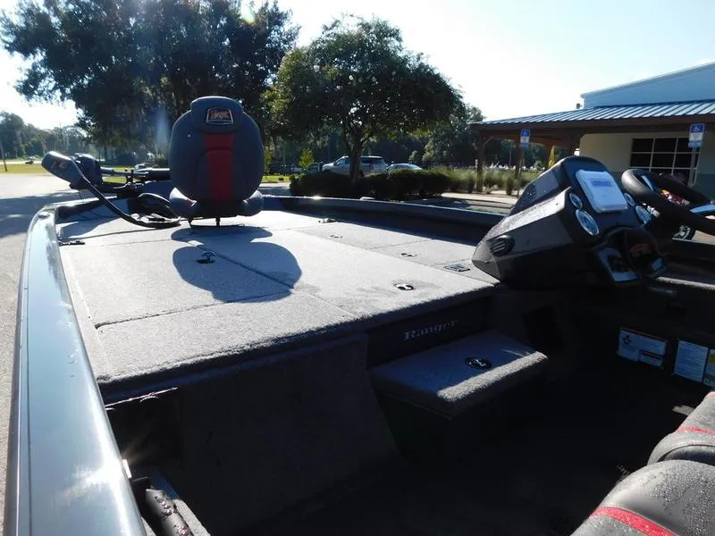 Slide: The Image of 2024 Ranger RT198P fishing boat interior with steering console and seating. - 9