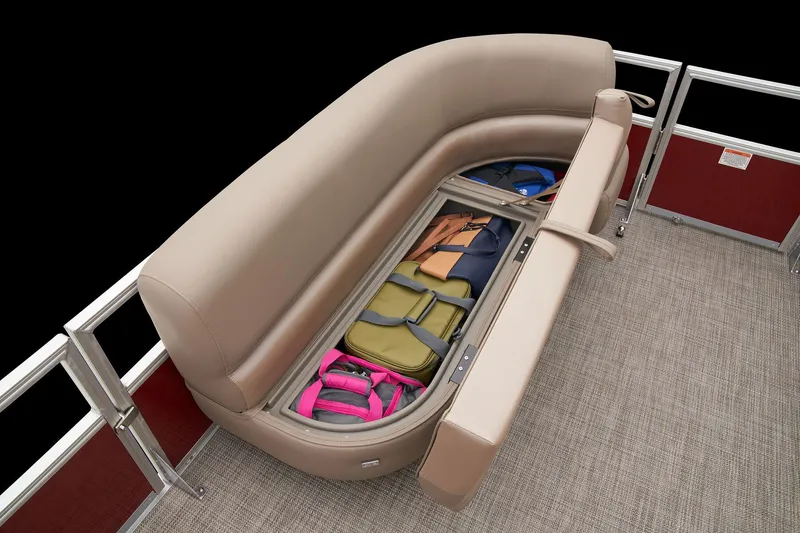 Slide: The Image of 2024 Ranger Reata 200C boat with under-seat storage compartment. - 22