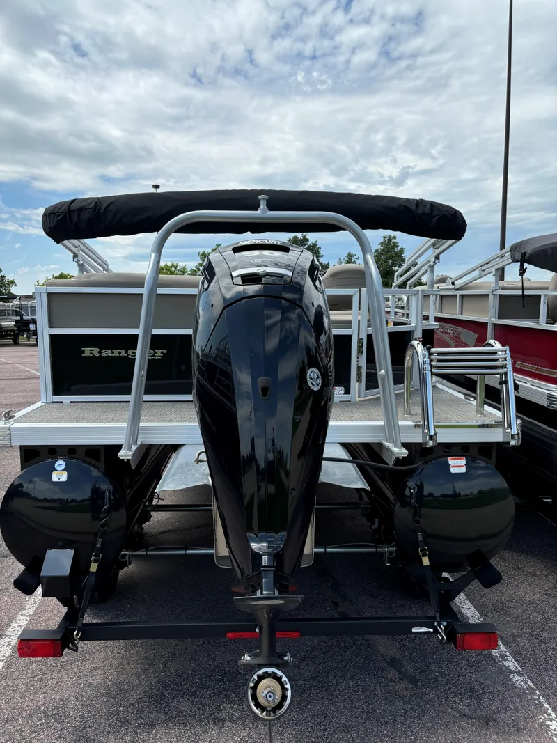 Slide: The Image of 2024 Ranger Reata 200C pontoon boat with outboard motor, rear view. - 3