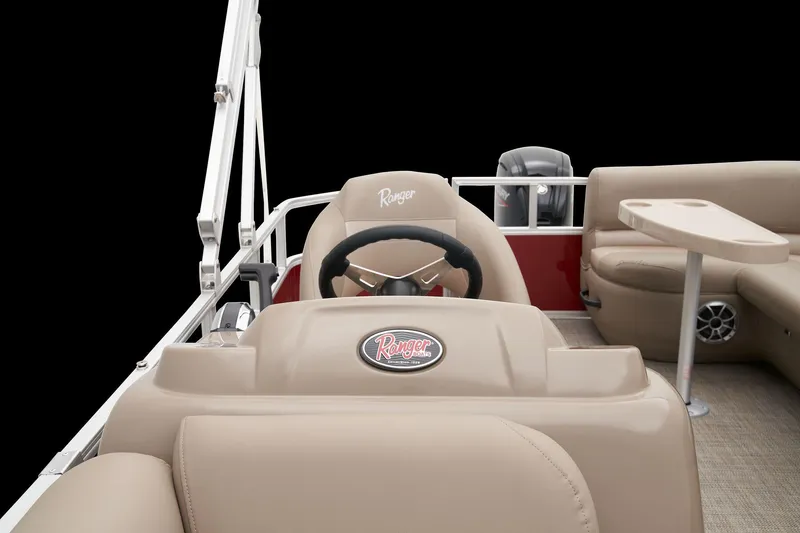 Slide: The Image of 2024 Ranger Reata 200C boat interior with steering wheel and seating. - 21
