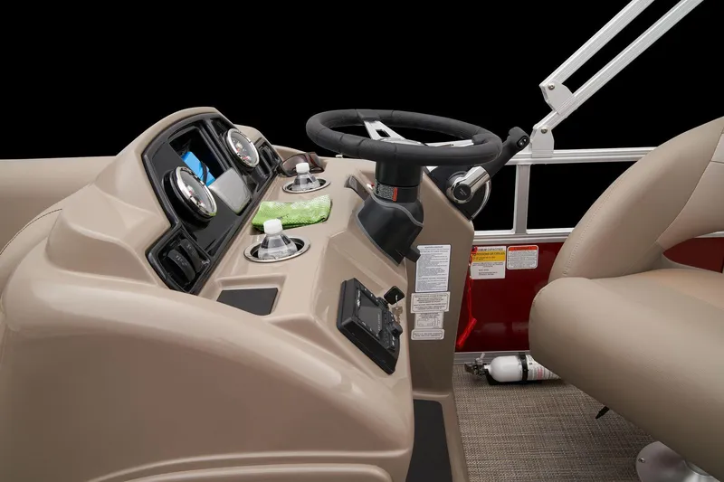 Slide: The Image of 2024 Ranger Reata 200C boat console with steering wheel and control panel. - 29