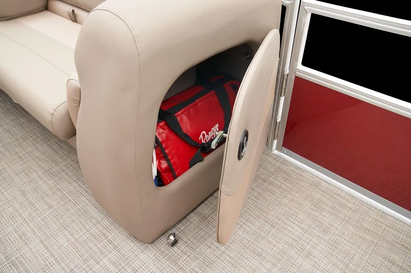 Slide: The Image of 2024 Ranger Reata 200C storage compartment with red bag. - 35